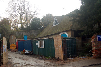Listed outbuildings at Clifton House November 2009 surrounded by builders' detritus